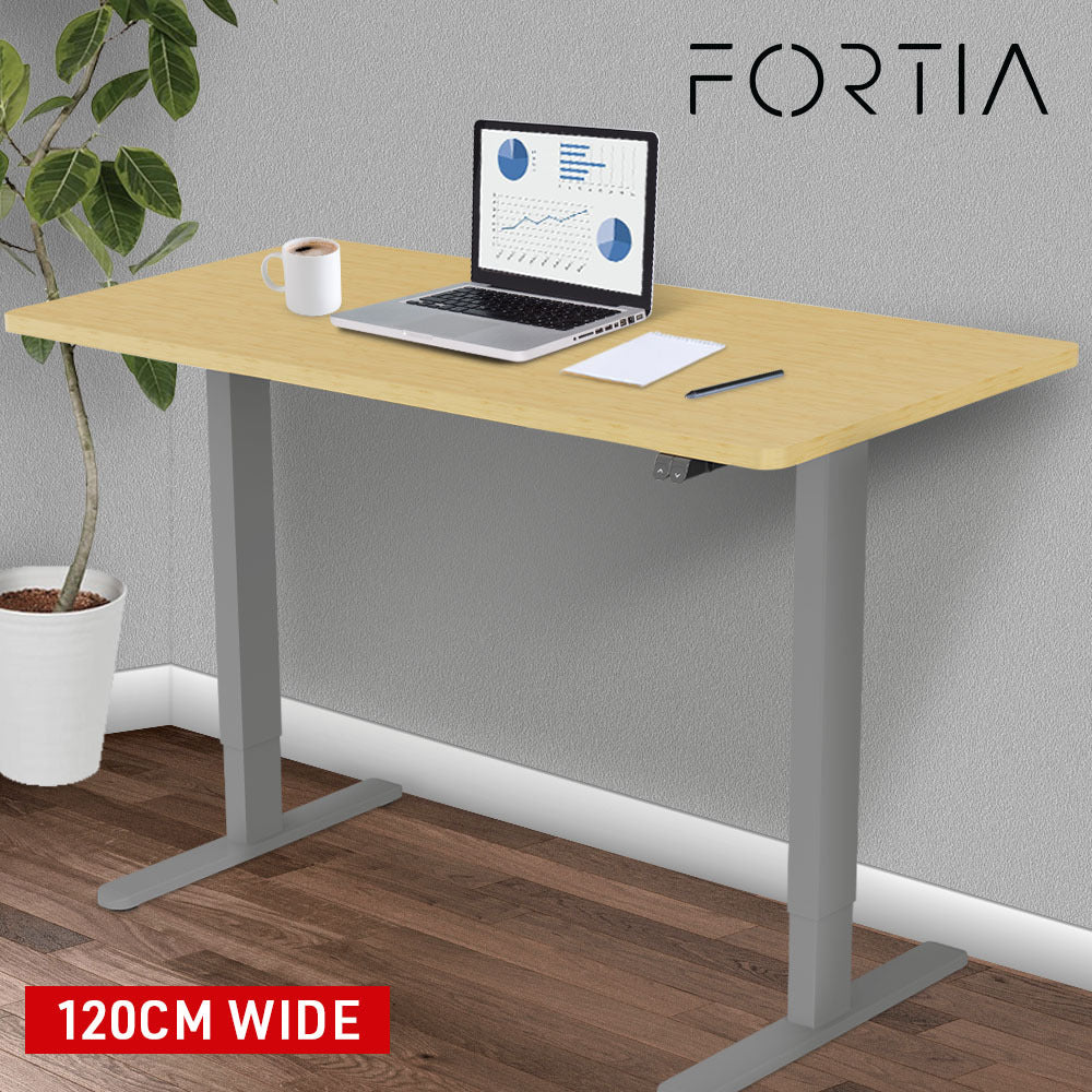 Fortia Sit To Stand Up Standing Desk, 120x60cm, 72-118cm Electric Height Adjustable, 70kg Load, White Oak Style/Silver Frame