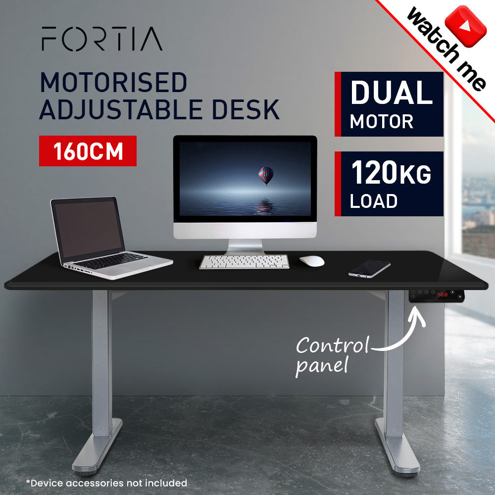Fortia Sit To Stand Up Standing Desk, 160x75cm, 62-128cm Electric Height Adjustable, Dual Motor, 120kg Load, Black/Silver Frame